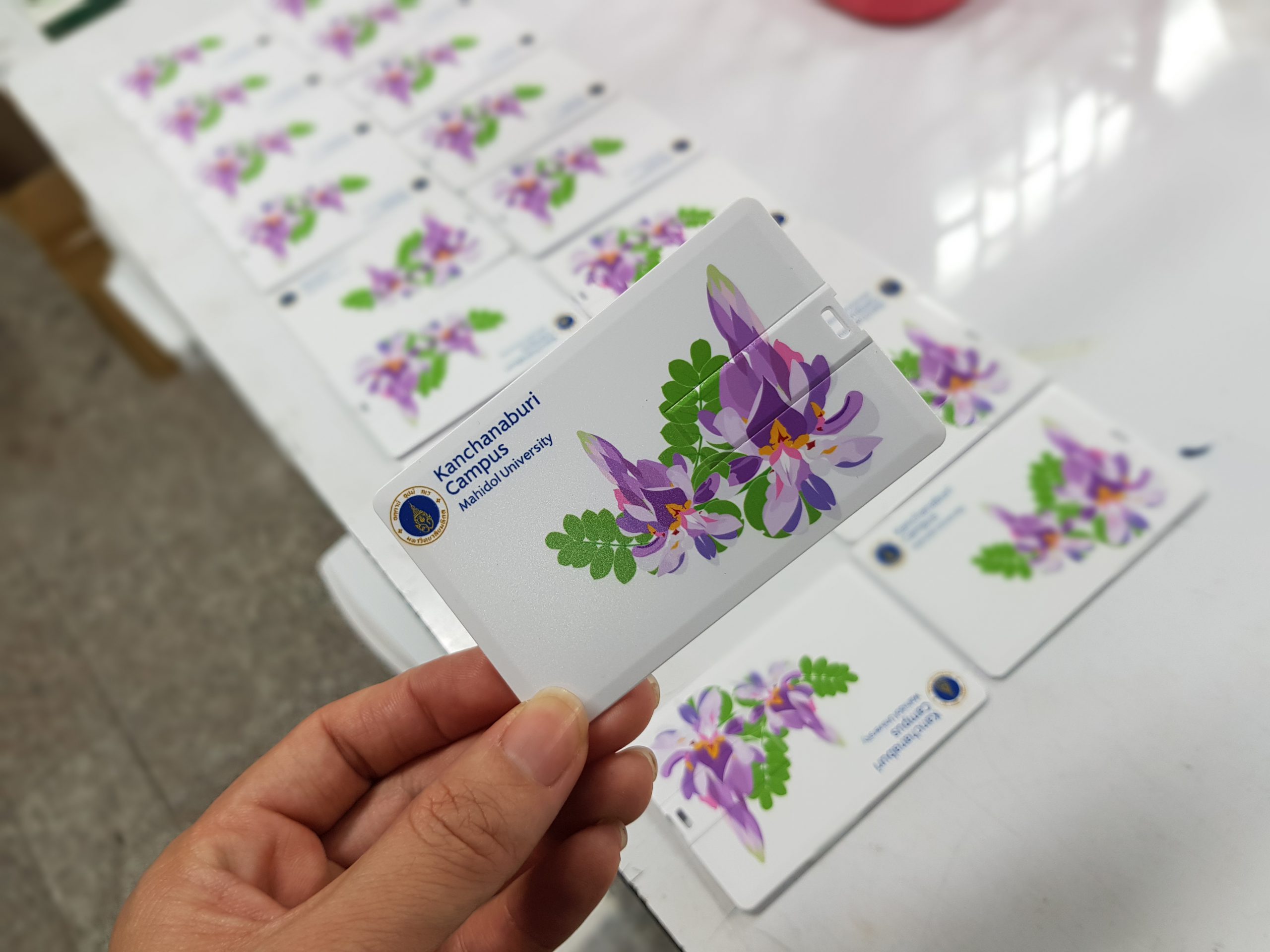 ผลงาน สินค้าพรีเมี่ยม แฟลชไดร์ฟ การ์ด Mahidol University โรงงานของพรีเมี่ยม