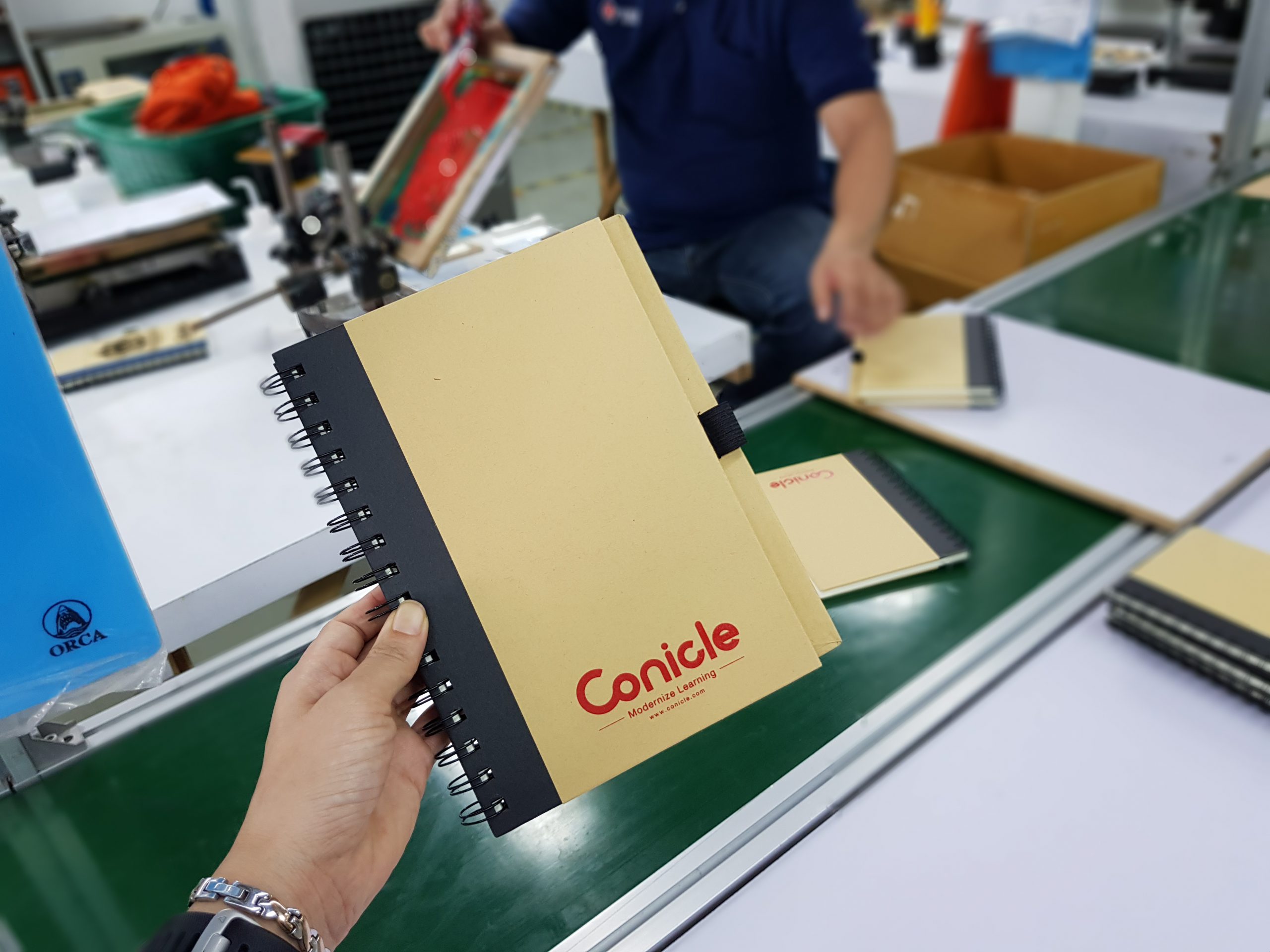 ผลงาน สินค้าพรีเมี่ยม สมุดโน๊ต Conicle