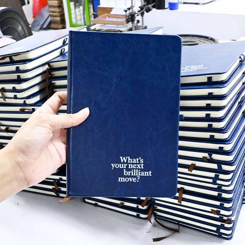 สมุดโน้ต-สกรีนโลโก้-what's-your-next-brilliant-move