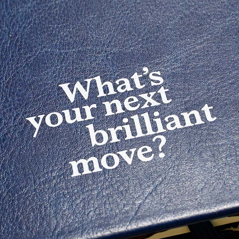 สมุดโน้ต-สกรีนโลโก้-what's-your-next-brilliant-move